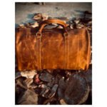 Avventura — Vintage Tan Distressed Genuine Leather Round Duffle Holdall Weekend Travel Bag