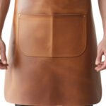 Caldo Maestro — Men's Warm Caramel Tan Genuine Full-Grain Cowhide Leather Heavy-Duty Adjustable Cross-Back Natural Strap Polished Silver-Tone Buckle Chest Pocket Large Front Multi-Pocket Chef Barber Blacksmith Craftsman Professional Workshop Utility Apron - Image 2