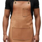 Chiaro Nobile — Men's Light Natural Buff Tan Genuine Full-Grain Cowhide Leather Heavy-Duty Adjustable Cross-Back Strap Antique Brass D-Ring Buckle Chest Pocket Large Front Multi-Pocket Chef Barber Blacksmith Craftsman Elegant Professional Workshop Utility Apron - Image 2
