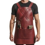 Vino Incrociato — Men's Deep Burgundy Wine Red Genuine Glossy Full-Grain Cowhide Leather Heavy-Duty Adjustable X-Cross Front Strap Snap-Button Fastening Side Tool Pocket Torch Holder Brush Slot Chef Barber Blacksmith Craftsman Bold Statement Professional Workshop Utility Apron