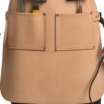 Grezzo Fabbro — Men's Pale Natural Raw Undyed Beige Genuine Thick Full-Grain Cowhide Leather Heavy-Duty Adjustable Cross-Back Tan Leather Strap Leather Loop Ring Fastening Chest Patch Pocket Triple Lower Tool Pocket Hammer Slot Brush Holder Drill Gun Loop Welder Carpenter Blacksmith Farrier Woodworker Craftsman Raw Natural Heavy-Duty Professional Workshop Utility Apron - Image 2