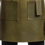 Muschio Avventuriero — Men's Moss Olive Vintage Army Green Genuine Distressed Waxed Full-Grain Cowhide Leather Heavy-Duty Adjustable Brown Leather Cross-Back Strap Antique Brass O-Ring Hardware Horizontal Front Zipper Chest Pocket Large Lower Left Tool Pocket Chisel Holder Right Side Utility Slip Pocket Contrast Stitch Detail Carpenter Blacksmith Woodworker Craftsman Chef Rugged Vintage Professional Workshop Utility Apron - Image 2